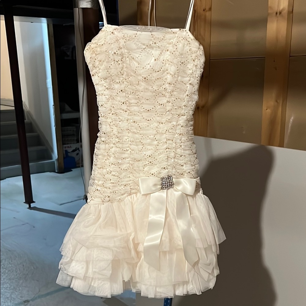 Cream Babydoll Dress with Sweetheart Neckline and Ruffled Tiers